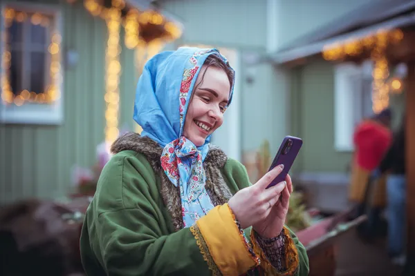 A glowing roulette wheel with cascading chips, symbolizing the engaging live and instant-win games available on KOKOZINO.